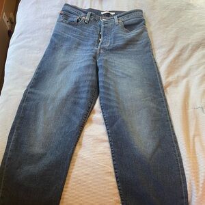 Levi's High Rise Blue Jeans with Relaxed Fit